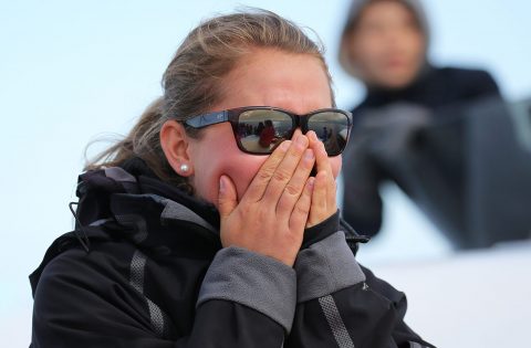 biologist Sydney showing her passion and emotion while viewing whales